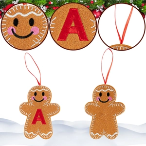 Detail of felt gingerbread man Christmas hanging decor with red embroidered letter A