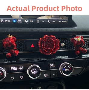 Red flocked bear and peony flower car air vent diffusers on dashboard clips