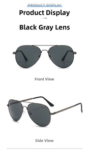 Detail view of aviator sunglasses with black grey lenses and double bridge metal frame