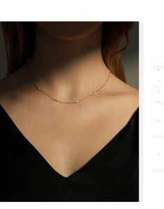 Close-up of s925 sterling silver choker necklace with sparkling stones on a model