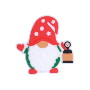 Vista dettagliata di una perla in silicone a forma di gnomo con cappello rosso e stelle