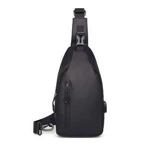 Minimalist black crossbody chest bag with adjustable strap and external USB charging port