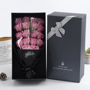 Detailed view of an 18-piece pink soap rose bouquet in an elegant black gift box