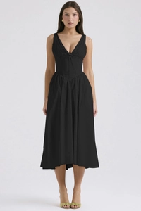 Detailed view of black V-neck corset midi dress with elegant waist design and slim fit