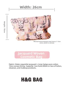 Detail showing pink floral jacquard cosmetic bag with dimension marking 26cm width