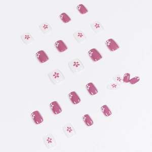Lavender floral press-on nails with pink and white flower designs in short square shape