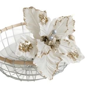 Champagne velvet poinsettia Christmas flower with gold sequins in a white basket