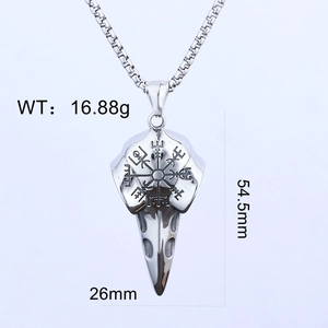Detailed view of silver Viking eagle skull pendant with Vegvisir compass engraving