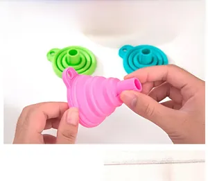 Collapsible silicone funnel set in pink blue and green with space saving folding design