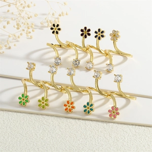 Set of 9 gold-plated adjustable rings with colorful enamel flowers and zircon stones