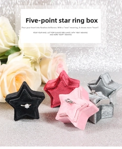 Star-shaped velvet ring boxes in multiple colors shown with romantic floral background