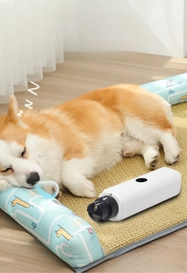 Detail showing white electric pet nail grinder with low noise feature and cogi background