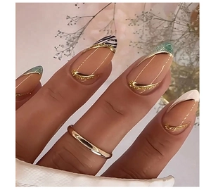 Macro shot of French almond press-on nails with zebra print and gold edges