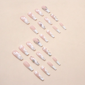 Long ballerina press-on nails with nude gradient, hibiscus flowers and glitter rhinestones