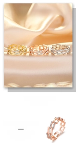 Macro detail of S925 sterling silver chain rings with pavé set crystals in three colors