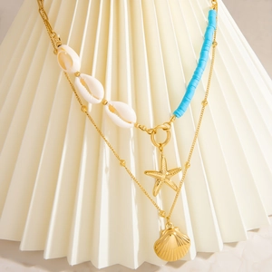 Double-layered 18K gold plated stainless steel necklace with natural shells and starfish