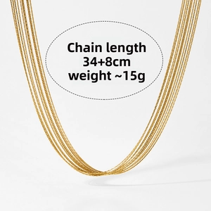 Detail of layered gold fringe necklace with 34cm plus 8cm extension and 15g weight