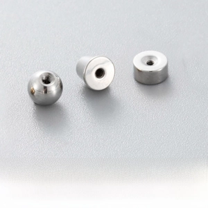 Macro detail of stainless steel screw-on earring backs for 0.8mm and 1.2mm posts