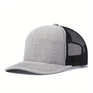 Side view of two-tone mesh trucker hat with gray fabric crown and black breathable mesh back