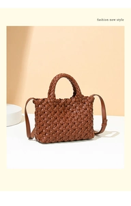 Detailed view of dark brown woven leather tote with intricate Intrecciato craft and strap