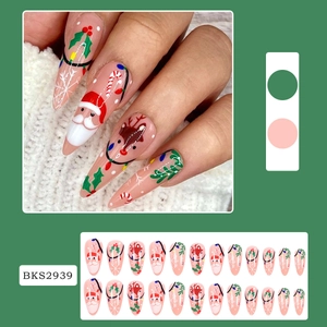 Detailed set of 24 almond shaped Christmas press-on nails with Santa and reindeer motifs