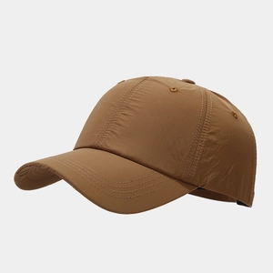 Detail view of khaki quick-dry baseball cap with reinforced stitching and breathable fabric
