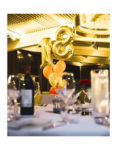 Golden number 18 foil balloons with confetti balloons for 18th birthday party decoration