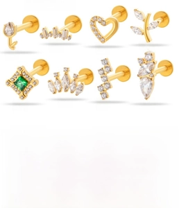Detailed view of titanium alloy labret studs with zircon inlays in various shapes