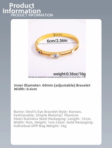 Macro detail of gold evil eye bangle with 60mm diameter and 0.6cm width specifications