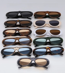Multiple color options for retro oval sunglasses in black, tortoise, and white frames