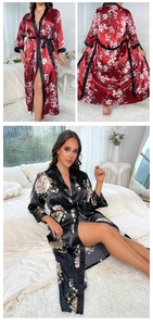 Detail of floral satin sleepwear showing smooth silk texture and elegant lily patterns