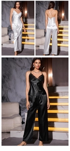 Detailed view of women's silk pajama set with lace neckline and cross back straps