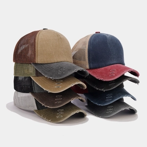 Retro washed baseball caps with mesh back and distressed brim in multiple colors