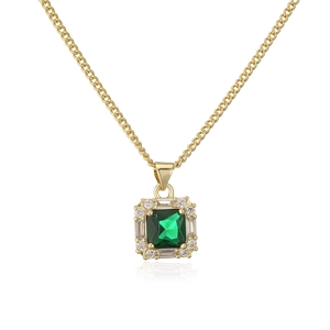 Detail view of 18K gold plated necklace with square green zircon and crystal pave stones