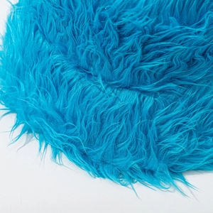Plush solid color bucket hat in bright blue faux fur featuring soft long hair texture