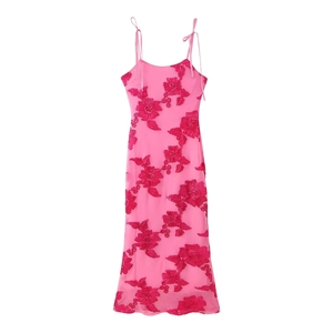 Detail of pink floral embroidery on sheer mesh sleeveless maxi vacation dress