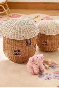 Detailed view of hand-woven mushroom storage baskets in a cozy nursery room setting