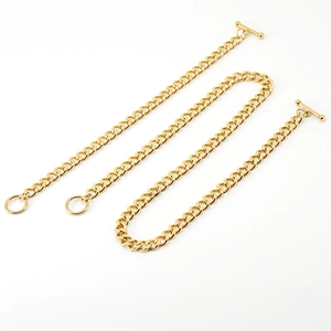 Detailed view of three 18K gold-plated stainless steel Cuban chains with OT toggle clasps