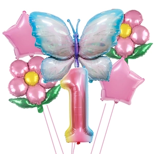 Detail view of butterfly and flower foil balloon set with large number 1 for birthday parties