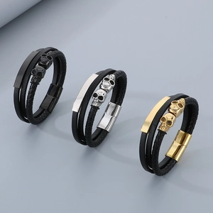 Men's multilayer braided leather bracelets with skull charms and magnetic clasps in three colors