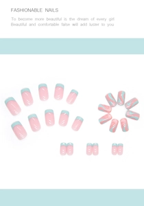 Detail of medium square press-on nails with light blue marble waves and French tip design