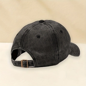 Rear view of vintage washed black baseball cap with adjustable metal buckle strap