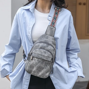Gray vintage canvas chest bag for women with colorful woven strap and multi-zipper pockets
