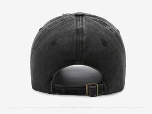Rear view of washed black baseball cap featuring distressed edges and adjustable metal buckle