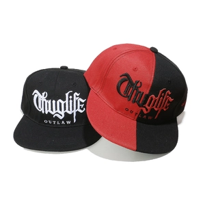 Detail of flat brim snapback caps with Thuglife 3D embroidery and twill cotton texture
