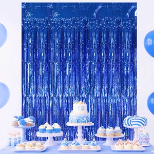 Blue tinsel foil fringe curtain for ocean theme party backdrop with balloon decorations