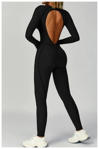 Detailed back view of a black high-stretch yoga jumpsuit featuring a large hollow-out design