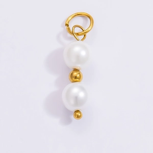 Detailed view of 18k gold plated butterfly pendant with large white pearls and beads