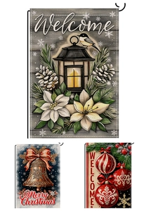 Close-up of double-sided Christmas garden flags with linen texture and festive patterns