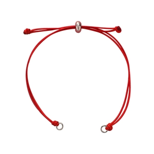 Detail of red braided cord bracelet featuring adjustable silver metal slide beads